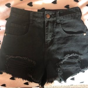 Distressed black high waisted shorts